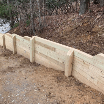 Wooden retaining wall construction service