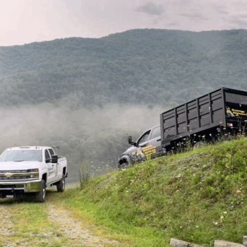 Landscaping trucks in mountainous area