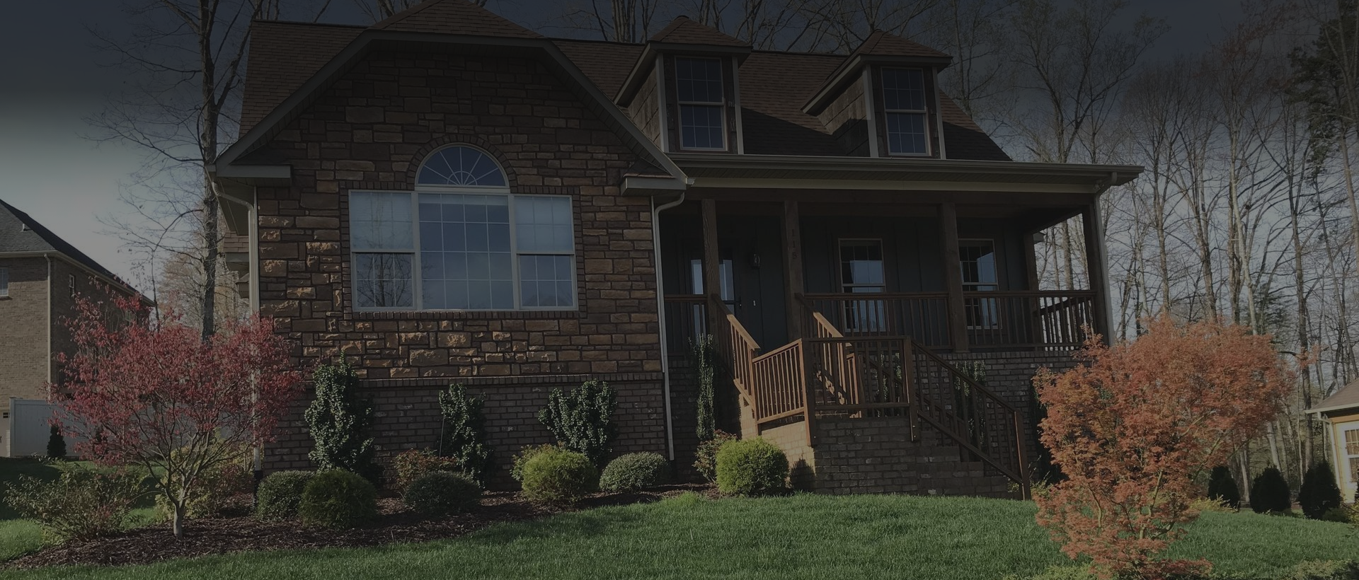 Brick house with landscaped garden
